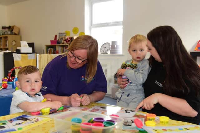 Staff and children at the new ABC123 Pre-School Nursery in Oxford Road, Hartlepool. From left, owner Kerry Dowdall, with Theo and staff member Chloe Crannage with Daniel.