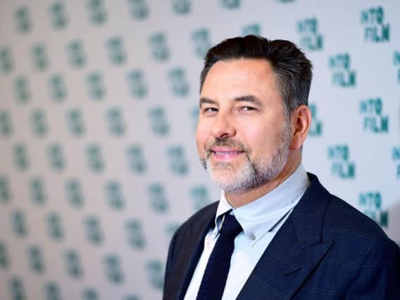 David Walliams, who has become the first Britain's Got Talent judge of the series to hit the golden buzzer after being brought to tears by a group of singing schoolchildren. Photo credit: Ian West/PA Wire.