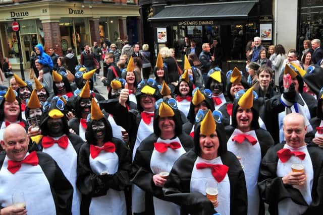 Pools fans as penguins in London for the final game at Crawley in 2013.