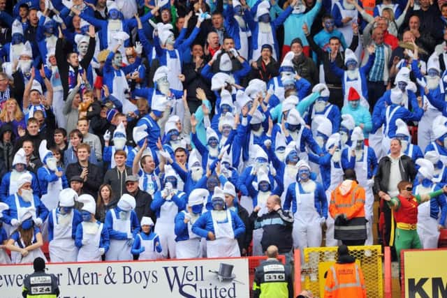 One of Pools fans most popular fancy dress as Smurfs at Charlton.