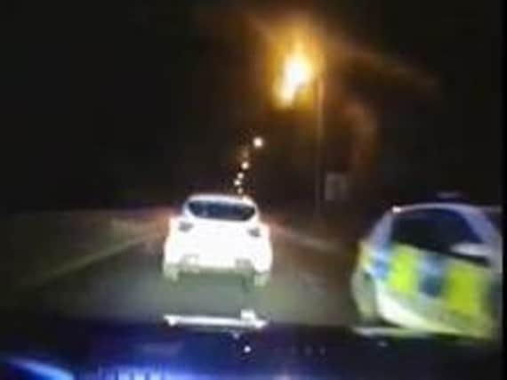 Police praised for stopped car chase.