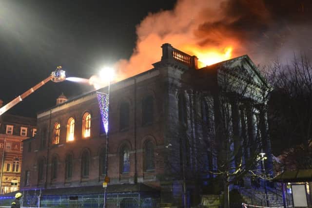 The Wesley building on fire. Pics by Tom Collins