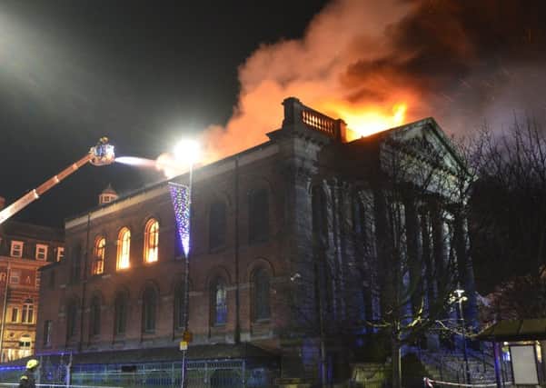 The Wesley building on fire. Pics by Tom Collins