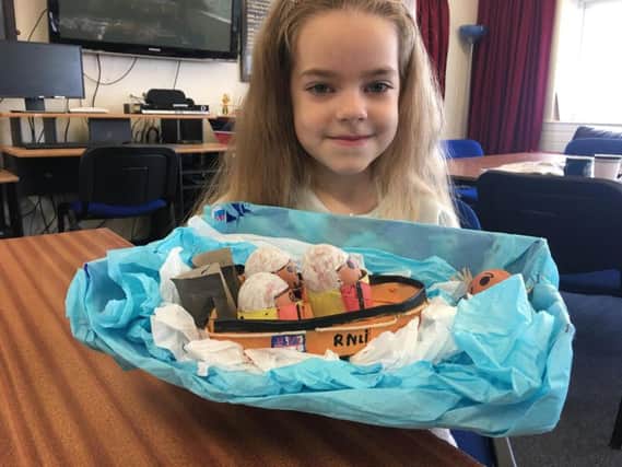Six year old Summer Jackson with her Easter RNLI creation. Picture:RNLI/Tom Collins.