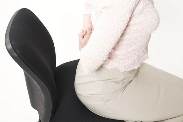 A poor posture can bring on back pain.