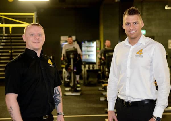 Adam Sowerby (left) with Chris Richardson inside Xercise4less. Picture by Frank Reid.