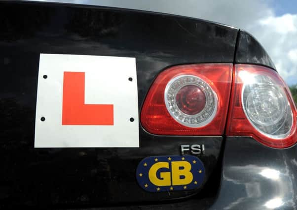 L plates on a car. Picture by PA Wire
