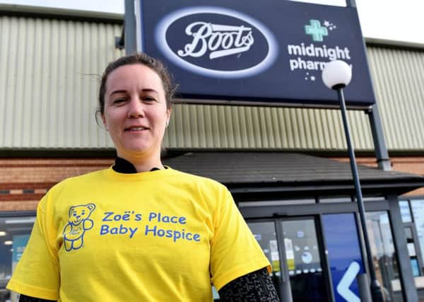 Gemma Hewitson outside the Marina branch of Boots before  the sponsored cycle ride in aid of Zoe's Place baby hospice.