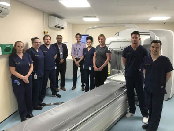 Staff welcome the new GE Discovery 850 SPECT-CT which combines two types of radiology images - functional molecular imaging with anatomical CT, to provide superior image quality.