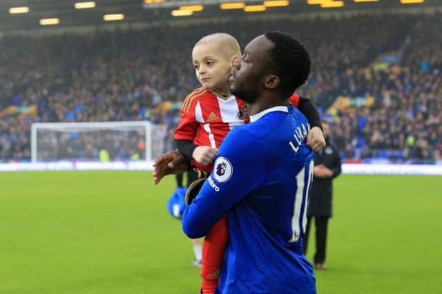 Bradley Lowery on the pitch with Romelu Lukaku at Goodison Park in January 2017. Picture: PA.