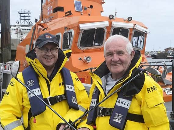 Golf event organisers Malcolm Wallis and Tommy Price(right). Image: RNLI Tom Collins.