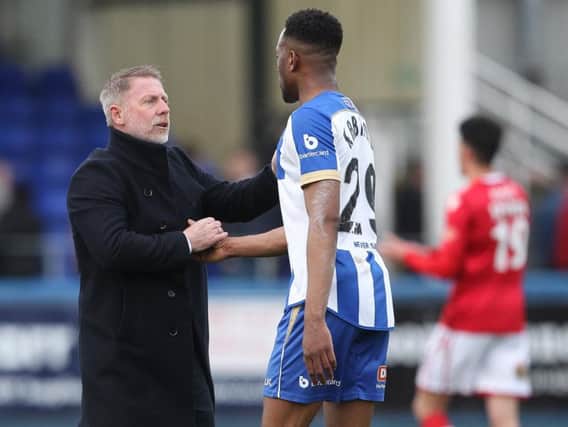 Manager Craig Hignett (left) brought in part-time player Nicke Kabamba, who netted seven goals in 17 games for Pools (Shutterpress).