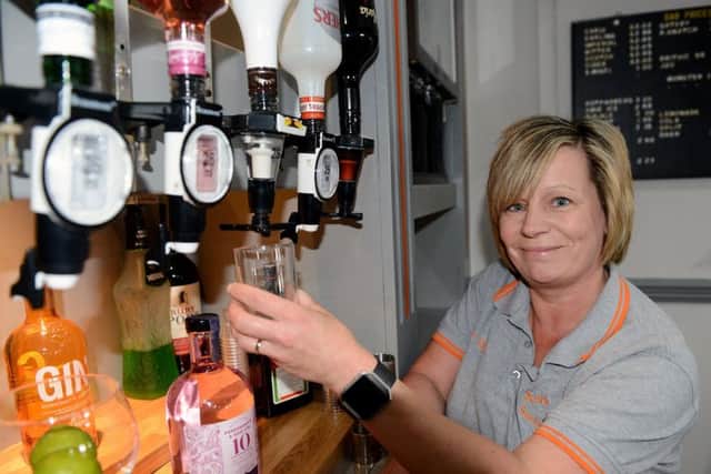 Nicola Sefton pulling a drink at the Acre Rigg Social Club. Picture by FRANK REID