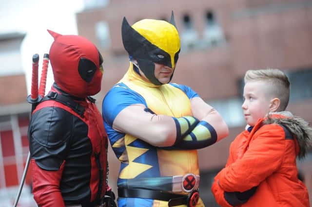 Empire Cinema's first Minicon to coincide with the launch of Deadpool - Karl Hicks as Deadpoll and David Golden as Wolverine, meeting youngster Callum Barker.