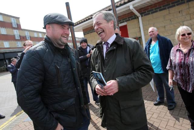 Nigel Farage speaks to comedian Danny Posthill at Hartlepool marina.
