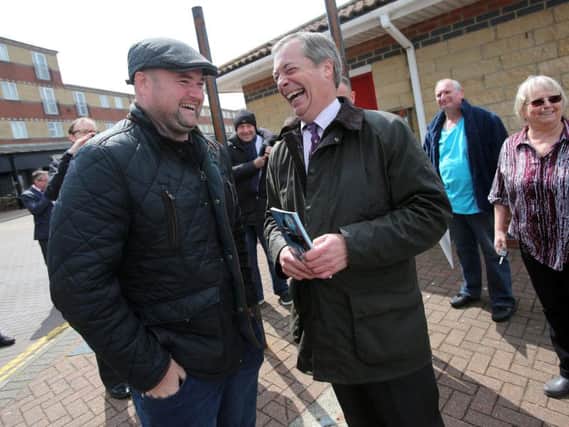 Nigel Farage speaks to comedian Danny Posthill at Hartlepool marina.