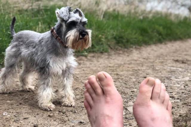 Paul Suggitt training for his barefoot chellenge with his dog Olga.