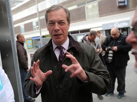 Nigel Farage speaks to members of the public as he campaigns in the North East.