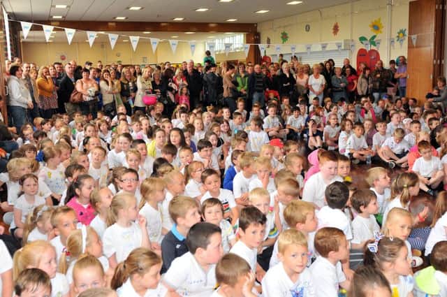 Throston Primary School pupils wait for the start of their sports day.