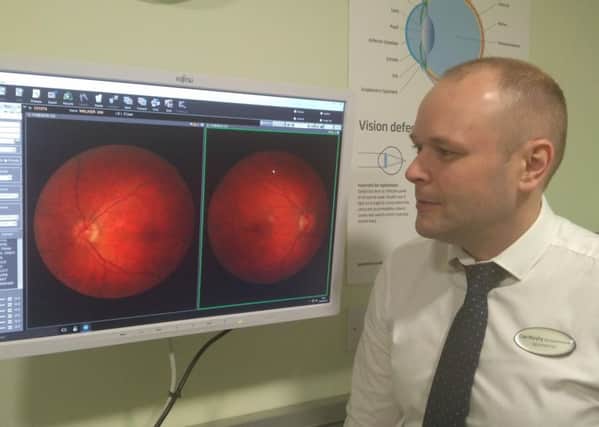 Cian Murphy examines results from the 3D eye scanner which has been bought by Specsavers in Hartlepool.