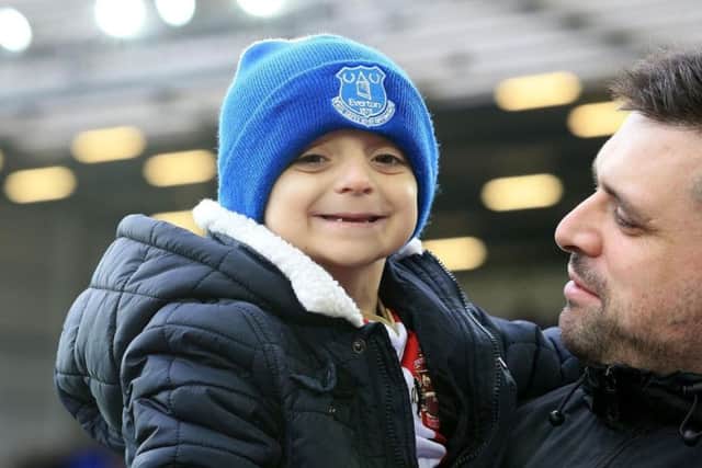 Bradley Lowery at Goodison Park with dad Carl. Picture: PA.
