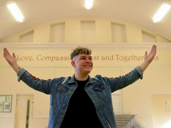 Michael Rice performs at his Hartlepool primary school in a visit to children and staff.