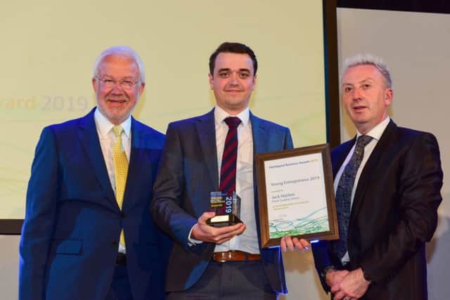 Young Entrepreneur of the Year Jack Hanlon receives his award from Hartlepool Council Leader Christopher Akers-Belcher (right) and Michael Bretherick (left) Director of Gus Robinson Foundation.