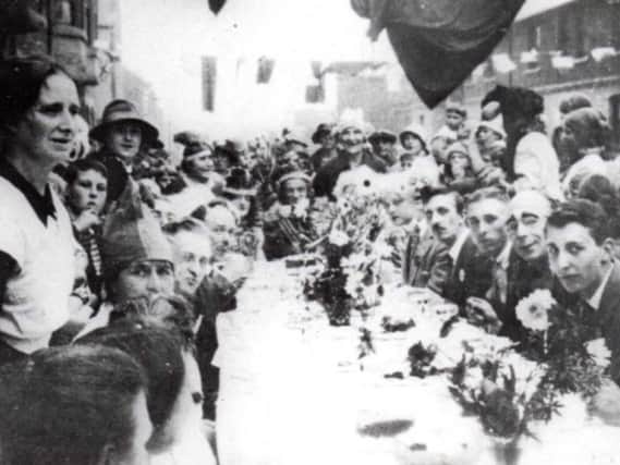 People at a Hartlepool street party to mark the end of the First World War.