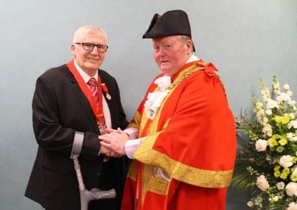 Cougoing ceremonial Mayor Allan Barclay and deputy Rob Cook
