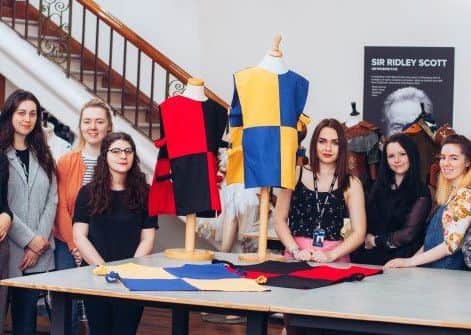 Level 5 costume design students from The Northern School of Art with some of the medieval knights costumes commissioned by Auckland Castle