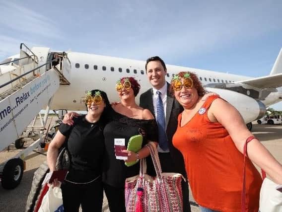 Tees Valley Mayor Ben Houchen with passengers at Durham Tees Valley Airport departing to Bulgaria