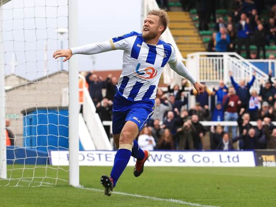 Nicky Featherstone celebrates scoring for Pools last season - his most successful in front of goal in blue and white. The midfielder scored four goals in 45 games (Shutterpress).