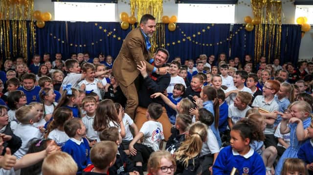 David Walliams during a visit to Flakefleet Primary School in Fleetwood, which was the school that he gave the golden buzzer to on this year's Britain's Got Talent. PRESS ASSOCIATION Photo. Picture date: Friday May 24, 2019. See PA story SHOWBIZ Walliams. Photo credit should read: Peter Byrne/PA Wire