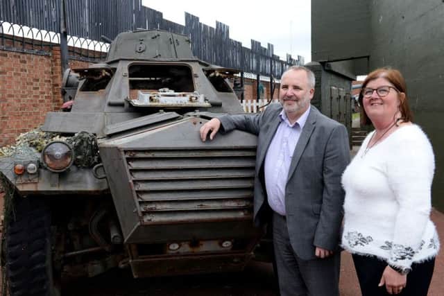 Heugh Battery Museum manager Diane Stephens and BAE Systems, Washington Operation manager Les Cooper alongside on of the military vehicles that is in need of repair Pictures by Frank Reid.