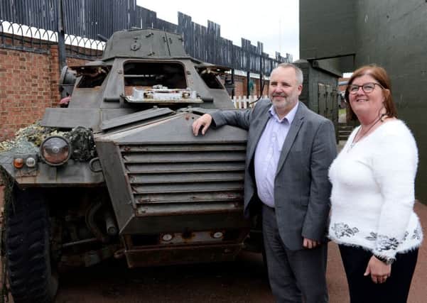 Heugh Battery Museum manager Diane Stephens and BAE Systems, Washington Operation manager Les Cooper alongside on of the military vehicles that is in need of repair Pictures by Frank Reid.