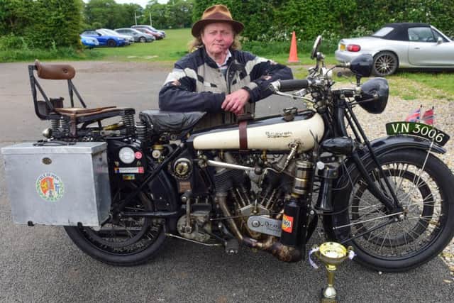 Ronald Hull and his Brough Superior moterbike, that was made for his grandfather in 1919 and has remained with the family.