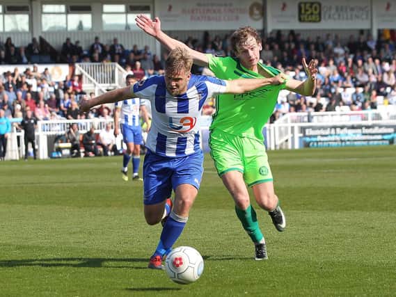 Cameron King of Halifax Town battles for possession with Nicky Featherstone of Hartlepool United during the Vanarama National League match between Hartlepool United and FC Halifax Town (Credit: Mark Fletcher | MI News).