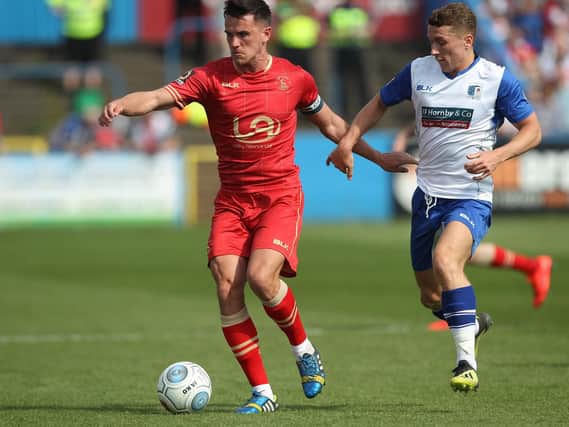 Ryan Donaldson of Hartlepool United in action with Josh Granite of Barrow during the Vanarama National League match between Barrow and Hartlepool United.