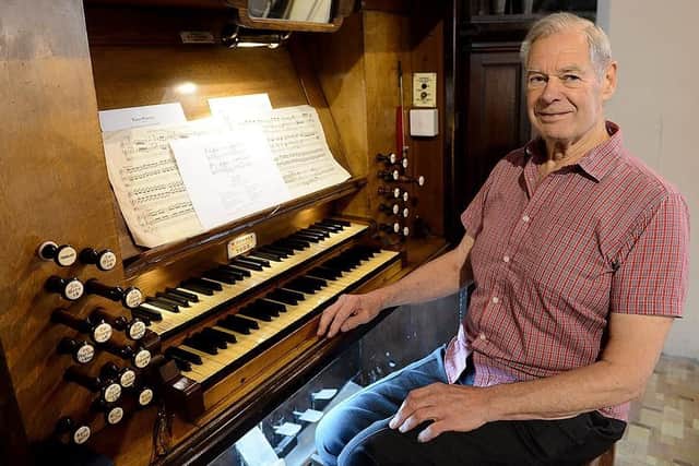 Organ restoration committee member Terry Curren sitting at the Organ in St. Mary's Church. Picture by FRANK REID