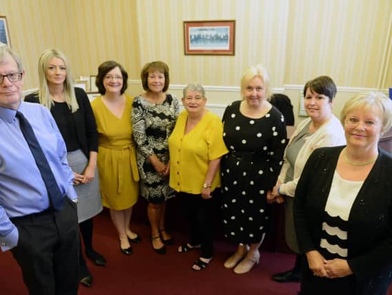Terence Creed (left) and Diane Brough (right) partners R Bell and Son Solicitors, Victoria Road, Hartlepool with staff (left to right)Susan Clouston, Caroline Gilhespy-Swan, Linda Travers, Agnes Standing, Christine Waller and Julie Dale.