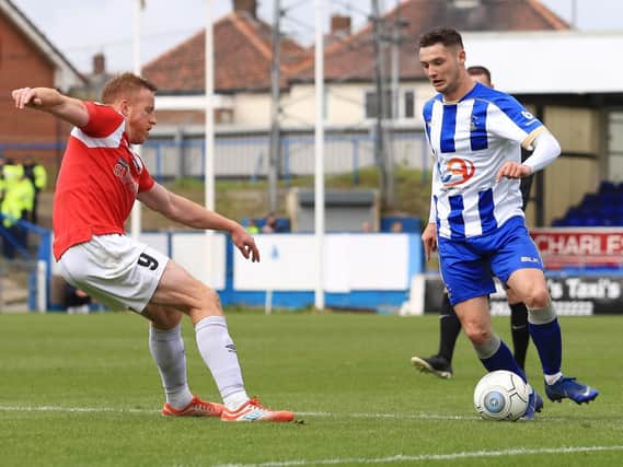Hartlepool United's Luke Molyneux competes for the ball.