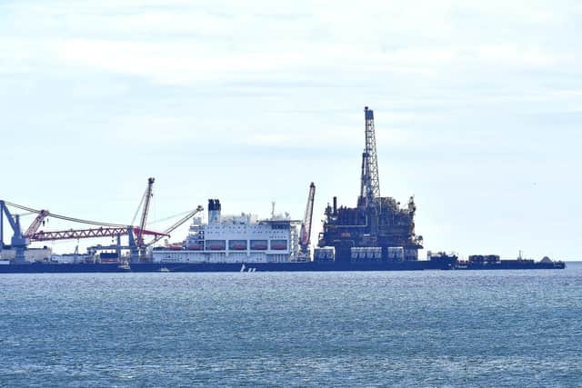The Brent Bravo Oil Platform off the Headland (right) with the Aliseas Pioneering Spirit. Hartlepool. Picture by FRANK REID