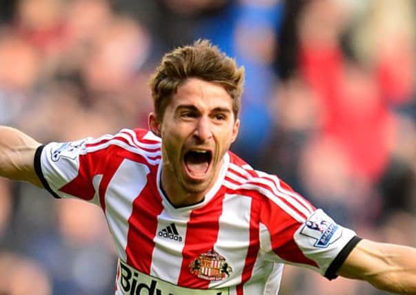 *Alternative Crop* Sunderland's Fabio Borini celebrates scoring his side's second goal of the game during the Barclays Premier League match at the Stadium of Light, Sunderland. PRESS ASSOCIATION Photo. Picture date: Sunday October 27, 2013. See PA story SOCCER Sunderland. Photo credit should read: Owen Humphreys/PA Wire. RESTRICTIONS: Editorial use only. Maximum 45 images during a match. No video emulation or promotion as 'live'. No use in games, competitions, merchandise, betting or single club/player services. No use with unofficial audio, video, data, fixtures or club/league logos.