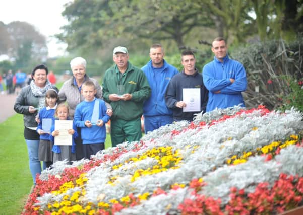 Shown with the awards at Horden Welfare Park are Yohden primary school pupils Morgan Wright, Leah Hanson and Josh Dowson with (left to right) Pat Wild, Isobel Roberts and park staff Walter Rudkin, Richard Hepworth, Cory Barron and Matthew Scott.