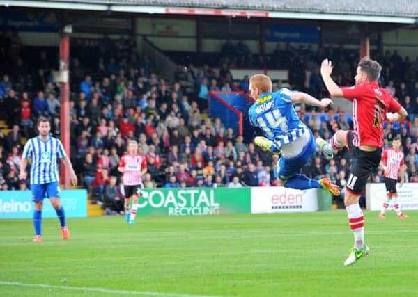 Michael Woods scores his first game for Pools against Exeter City. Picture by FRANK REID