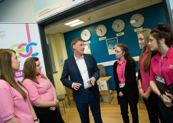 CAREER TALK: Hays Independence Group founder and director John Hays chats to students at East Durham Colleges Peterlee Campus after the official opening of the colleges own travel agency.