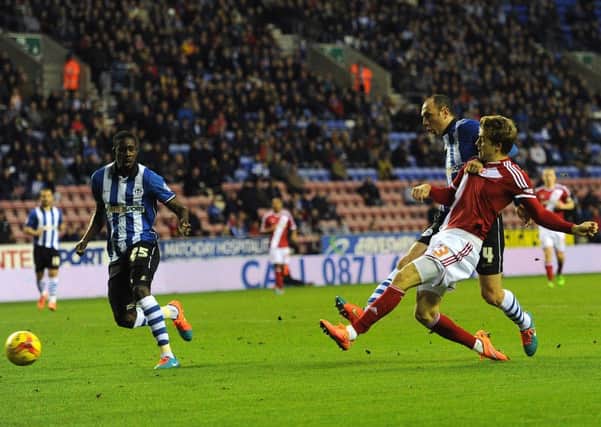 GET IN: Patrick Bamford (right) scores for Boro at the DW Stadium