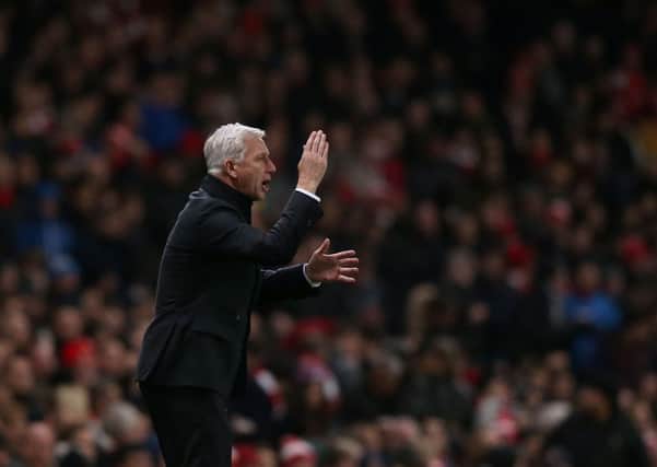 Newcastle United manager Alan Pardew on the touchline during the  match at the Emirates Stadium