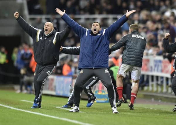 Sunderland manager Gus Poyet celebrates the winning goal in the  match at St. James's Park