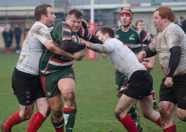 DERBY ACTION: West (green) v Rovers. Picture by JOE SPENCE